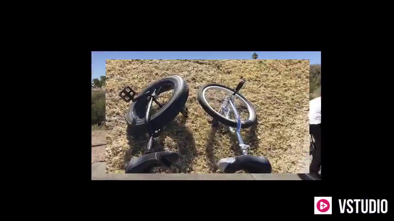 Riding both unicycles as a bike YouTube
