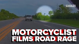 Road rage: Motorcyclist captures moment truck driver allegedly throws rock out window