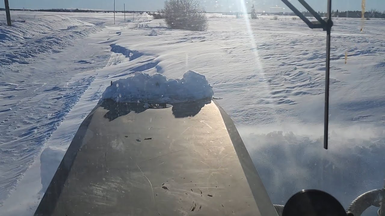Digging out after more snow and high winds - YouTube