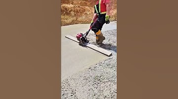 The process of smoothing the cement mixture on the floor media #contructions #cementing #popular
