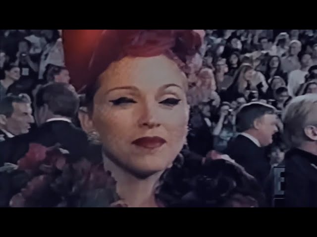 E! report on Evita premiere +  interview 1996 class=