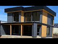 Будівництво сучасних будинків в Україні / Огляд будинку в стилі Hi-Tech / Будинок з плоским дахом