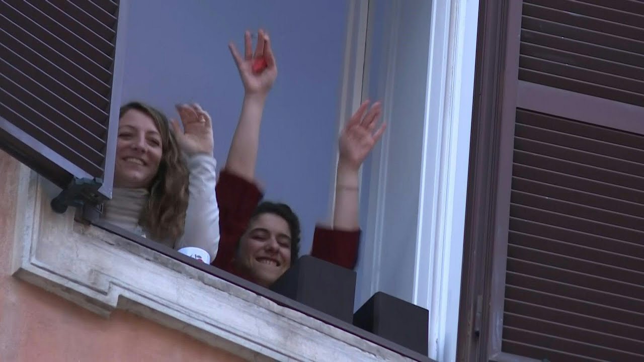 Balcony sing-song for Rome residents trying to stave off coronavirus blues | AFP