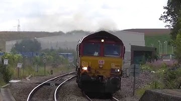 DB schenker 66112  with Hayes & Harlington to Moreton on lugg empty stone train