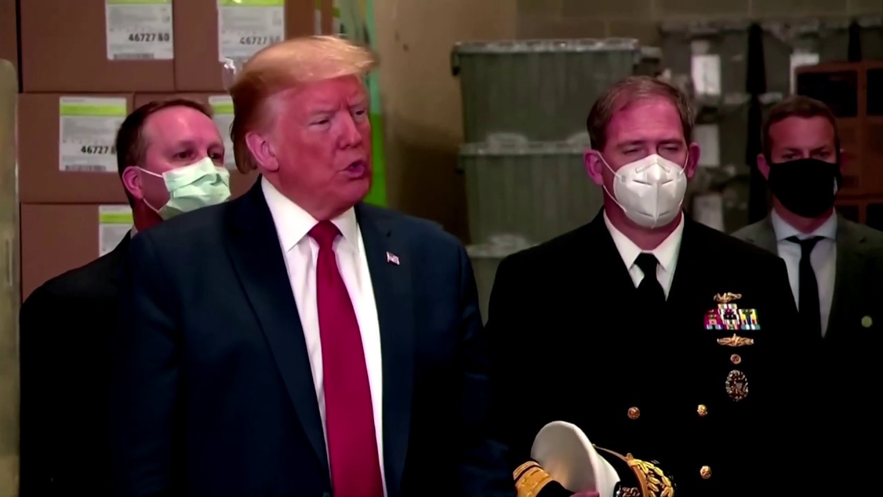 Without wearing a mask, Trump tours Pennsylvania mask distribution center