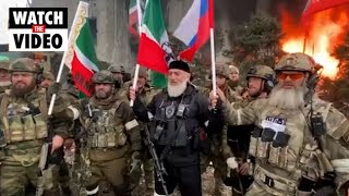 Chechen forces celebrate outside steel plant in Mariupol Resimi