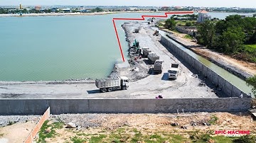 Excellent Skill Operator Wheel Loader Pushing Moving Huge Stone To Deep Water For Building New Road