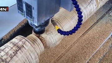 omni cnc router working on column wood material