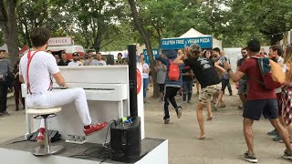 Piano Busker and his crowd celebrate Freddie Mercury’s music