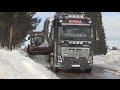 Volvo L90G with Øveraasen snowblower loading four trucks