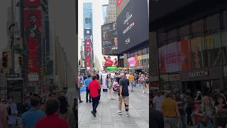 Walking Through A Hot Times Square
