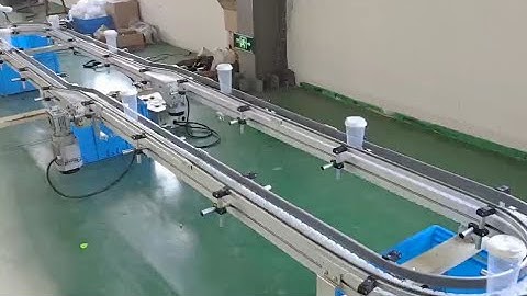 Round circle plastic bottles conveying flexible chain conveyor testing in Maxsen factory 2
