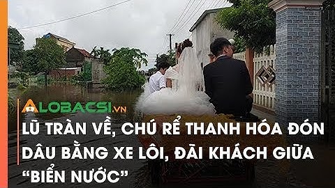 Lũ tràn về, chú rể Thanh Hóa đón dâu bằng xe lôi, đãi khách giữa "biển nước"