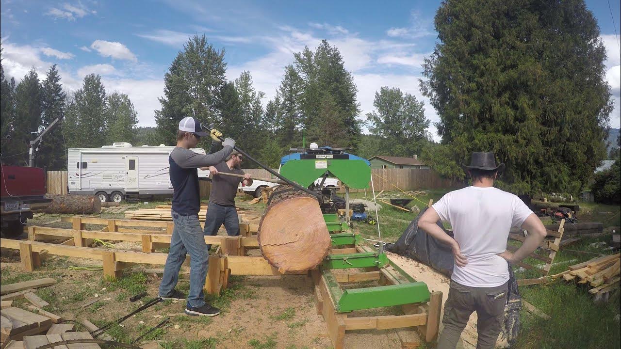 sawing a big 27 inch pine log on the harbor freight sawmill YouTube