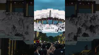 Live performance on an LED skybridge stage in West Lake, Hangzhou