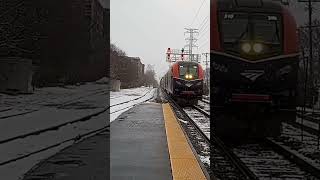 Westbound Amtrak Empire Builder train to Seattle WA passing Morton Grove in the snow ()
