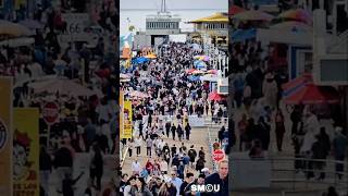 𝗕𝗘𝗙𝗢𝗥𝗘 𝗧𝗛𝗘 𝗦𝗧𝗢𝗥𝗠: Visitors Fill Santa Monica Pier as Rain Moves In