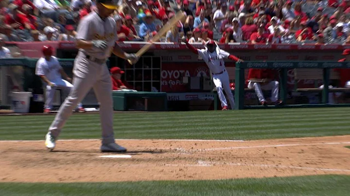 OAK@LAA: Angels coach Alfredo Griffin snags foul b...