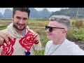 Tracing China: Foreign vloggers experience Mulam culture in Luocheng, Guangxi