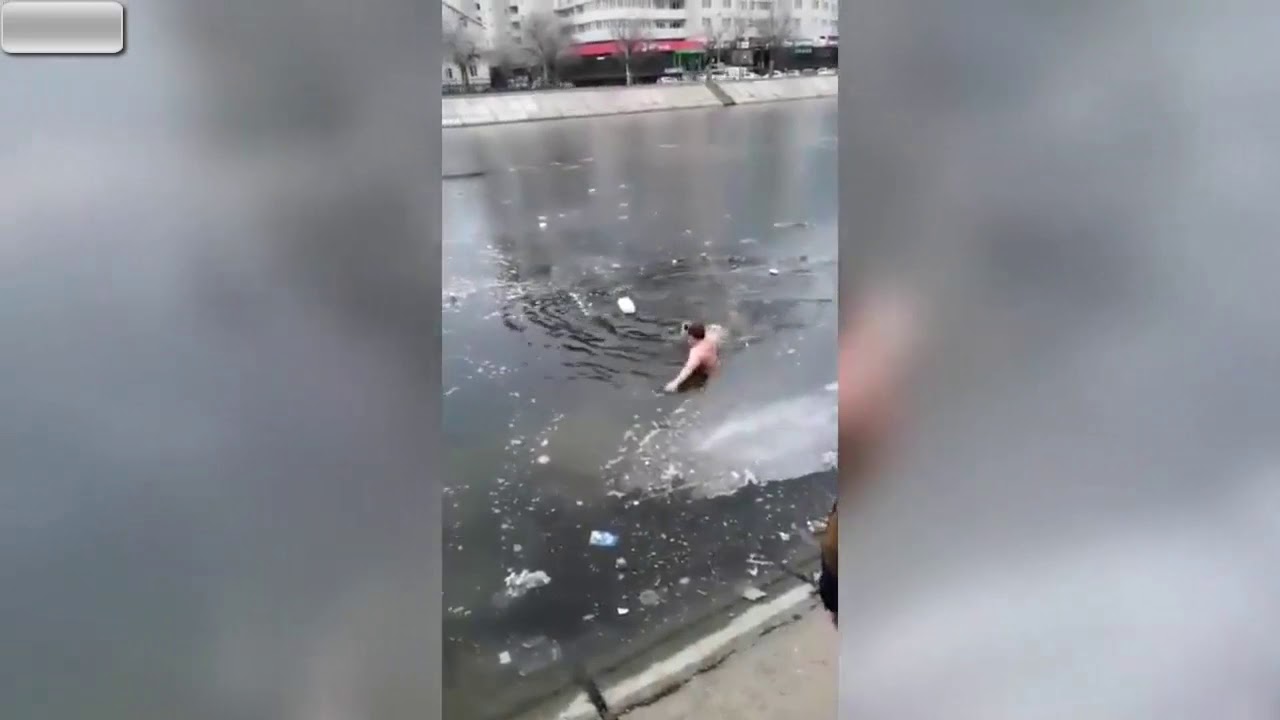 Man Plunges Into Icy River To Rescue Drowning Dog - YouTube