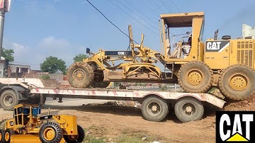 Caterpillar 120 k2 motor grader unloading from trailer|#cat #tractor #jcb #tata #truck #trending