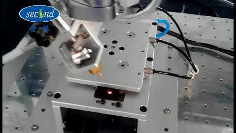 AB 2 component glue mix with pre determine ratio dispense by a robotic system on a rotating jig