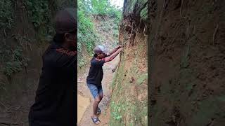 young man takes marmoci out of hole in ground #shortvideo #ihavethisthingwithplants