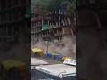 Moment landslide crushes buildings in India