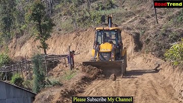 Jcb pushing soil in hill_ Backhoe leveling soil in hill