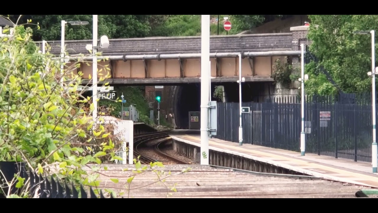 EWS (English Welsh and Scottish Railways) class 66 passing through Lewes.