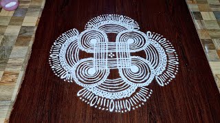 Padikolam begins with 4×4 square pattern extended cure lines | creativerangoli |