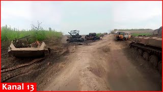 Image of destroyed Russian vehicles along road in Zaporozhye - tanks, armored vehicles...