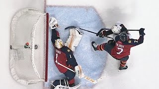 Luongo extends arm for superb glove stop