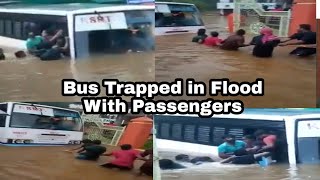 Bus Trapped In Floods Along With Pengers In Kerala Later Local Evacuated Them Safely.