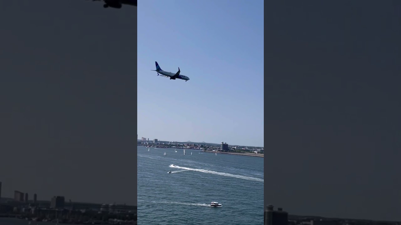 Airplanes landing in Boston fly past our cruise ship