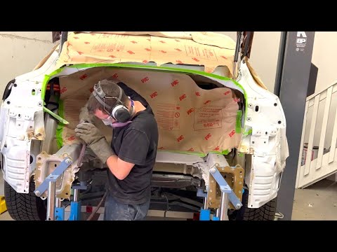 Part 2 Structural Collision Repair Process on rear end of Tesla Model 3 on Celette bench