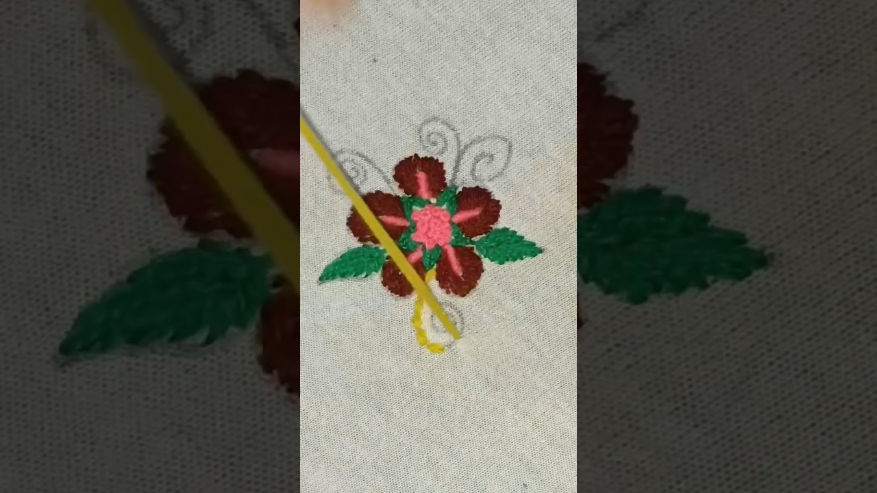 A delicate design of hand-embroidered floral motifs