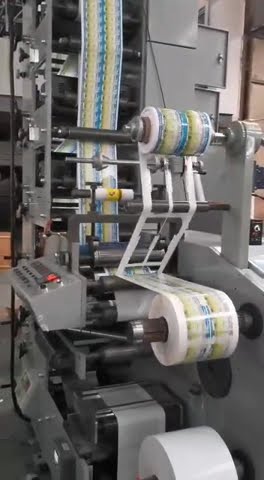 label flexo printing and rotary cutting machine - YouTube