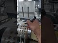 Adjustment of the paper holding clamps on the forming mold