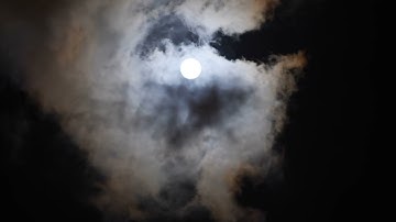 Beautiful full Moon in clouds/ in night sky  mystical  moon and clouds / Full moon HD video