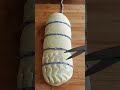 Dough shaping process using string and scissors for neat form #bakingprep #foodcraft #kitchenwork