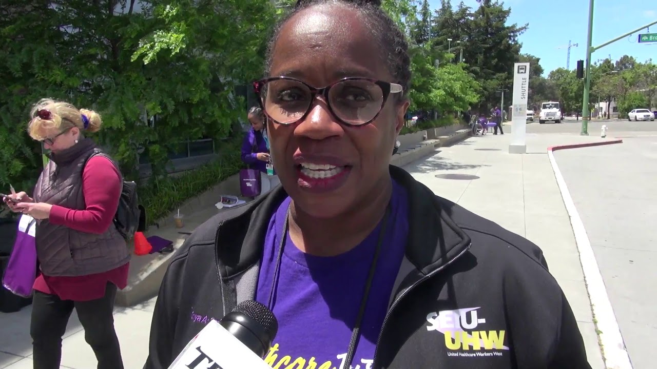 Workers rally at Kaiser Permanente for affordable healthcare and better ...