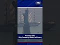 Tall ship passes by Statue of Liberty for Sail4th 250