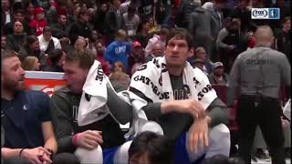 Luka Doncic and Boban messing around on the bench