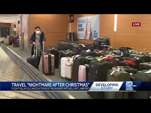 Luggage piled at Mitchell International Airport
