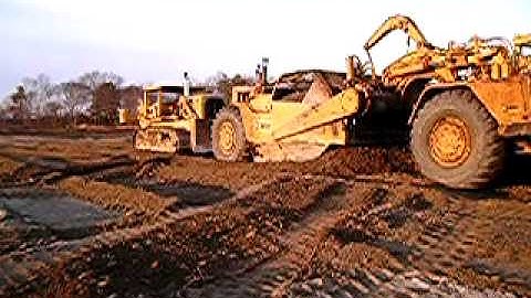 Loading a CAT 631 Scraper