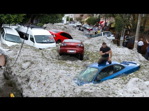 Hundreds of cars are wrecked by a terrible hail storm in Puebla, Mexico