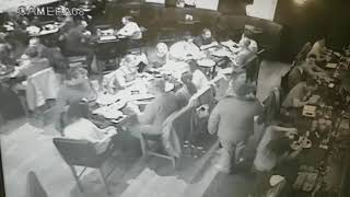Theft caught on camera stealing a wallet out of a purse in a restaurant