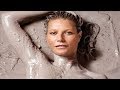 Gwyneth Paltrow conceals her modesty with nothing but clay as she strips off for cover of her new ma