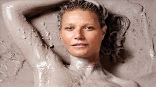 Gwyneth Paltrow conceals her modesty with nothing but clay as she strips off for cover of her new ma